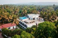 B&B Morjim - StayVista Ashore 6BHK Infinity Pool Ocean View- Morjim - Bed and Breakfast Morjim