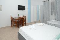 One-Bedroom Apartment with Balcony and Sea View