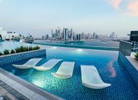 Chic Palm Studio with Infinity Pool - Chambres d’hôtes Dubaï
