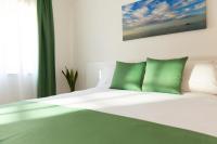 Dreibettzimmer mit Gartenblick