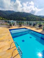 Apartamentos a 200m praia das Toninhas - Condomínio Vista Verde | Piscina na Cobertura com vista Espetacular - Chambres d'hôtes Ubatuba
