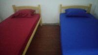 Single Bed in Dormitory Room