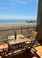 Appartamento fronte mare con terrazzo e parcheggio privato - Chambres d’hôtes Lignano Sabbiadoro