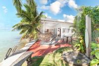 Seaside Serenity: 2BR Oasis on Enchanting Moorea - Chambres d’hôtes
