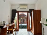 Jingga Guesthouse - Ferienwohnung