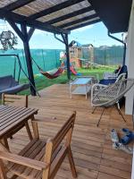 B&B Berceni - Casa la curte cu terasa,gratar si loc de joaca pentru copii - Bed and Breakfast Berceni