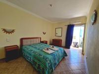 One-Bedroom Apartment with Balcony and Side Sea View