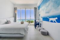 Zimmer mit Queensize-Bett und Meerblick