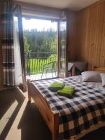 Kamer met Queensize Bed en Balkon