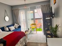 Cozy condo in the heart of Maboneng - Chambres d'hôtes Johannesbourg