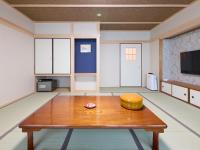 Camera Familiare con Bagno in Comune