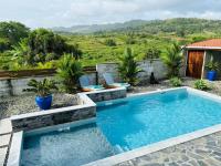 Refuge PêBê Joli logement au coeur d'un immense jardin tropical - Chambres d'hôtes Ducos