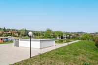 HOST4U - Garda Lake Lido Apartments With Pool, Garden and Private Parking in Garage - Bed and Breakfast Padenghe sul Garda