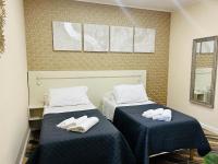 Camera Doppia con Letti Singoli