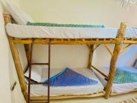 Cama en habitación compartida mixta de 4 camas