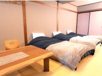 Camera Quadrupla Economy