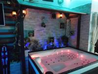 L'histoire de l'ouest , jacuzzi appartement - Ferienwohnung