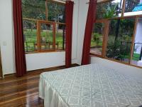 B&B Mindo - CABAÑAS GOLDEN TANAGER - Bed and Breakfast Mindo