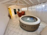 B&B Petit-Bourg - Oasis familiale avec jacuzzi - Petit-Bourg - Bed and Breakfast Petit-Bourg