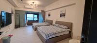 B&B Toucheng - 頭城烏石港 53 無敵海景 溫泉湯宅大套房 - Bed and Breakfast Toucheng