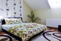 Two-Bedroom Upstairs Apartment with Garden View