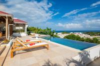 Résidence Les Raisins Clairs - Villas standing 4 étoiles , vue sur mer panoramique & piscine à débordement - Chambres d'hôtes Saint-François