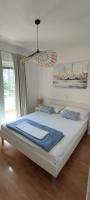 One-Bedroom Apartment with Balcony and Sea View