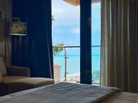 Driepersoonskamer met Uitzicht op Zee