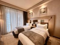 Deluxe Tweepersoonskamer met 2 Aparte Bedden en Uitzicht op Zee