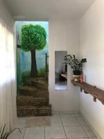 Casa completa localizada a cerca a 1 km da praia de Taperapuã - B&B