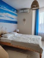 Two-Bedroom Apartment with Balcony and Sea View