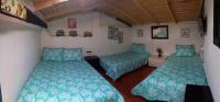 Economy Quadruple Room with Shared Bathroom