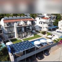 Stone House Aparts 2 plus 1 mit zwei Balkone und Poolview Kalkan No 10 - B&B