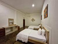 Camera Matrimoniale/Doppia con Letti Singoli con Vista Giardino