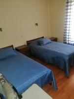 Tweepersoonskamer met 2 Aparte Bedden