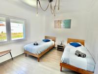 Tweepersoonskamer met 2 Aparte Bedden