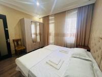 Квартира для семьи от 4-8 Человек - Bed and Breakfast Batoemi