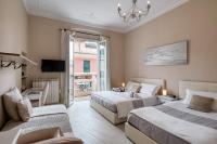 Chambre Triple avec Salle de Bains Privative et Balcon