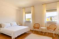 Zimmer mit Queensize-Bett und Meerblick