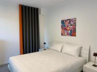 One-Bedroom Apartment with Terrace and Lake View