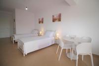 Quadruple Studio with Balcony and Side Sea View