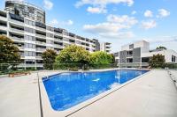 Relaxing 1BR w Pools & SPA, Gym in Olympic Park - B&B