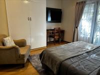 Chambre Lit Queen-Size - Vue sur Jardin