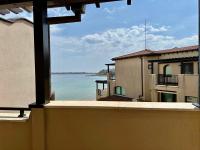 One-Bedroom Apartment with Sea View and Balcony