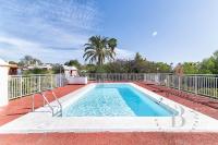 Oasis con piscinas y jardines en Maspalomas - B&B Maspalomas