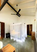 Chambre Double ou Lits Jumeaux Deluxe – Vue sur Jardin