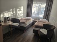 Kleine Tweepersoonskamer met 2 Aparte Bedden