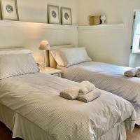 Standaard Tweepersoonskamer met 2 Aparte Bedden - Gedeelde Badkamer