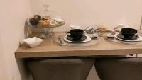 Central Suite - Ferienwohnung Tarent