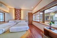 Chambre Lits Jumeaux - Vue sur Jardin